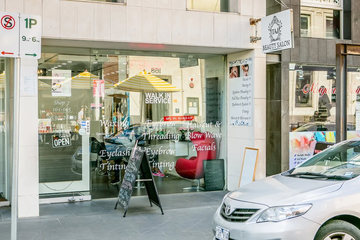 Taj Beauty Salon on Greville Street &mdash; shopfront and crest sign